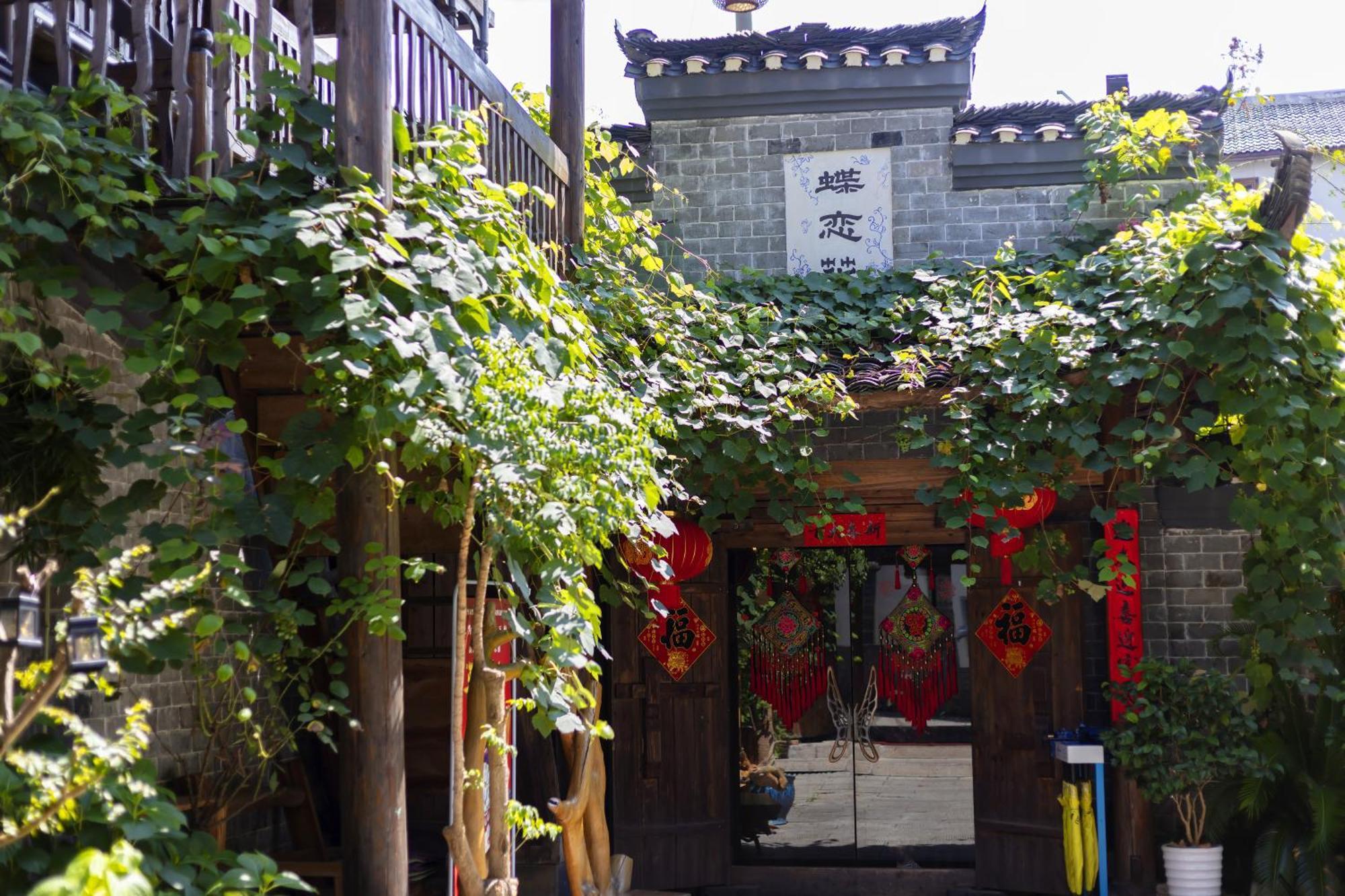 Butterfly Flowers Inn Жангжиаже Екстериор снимка